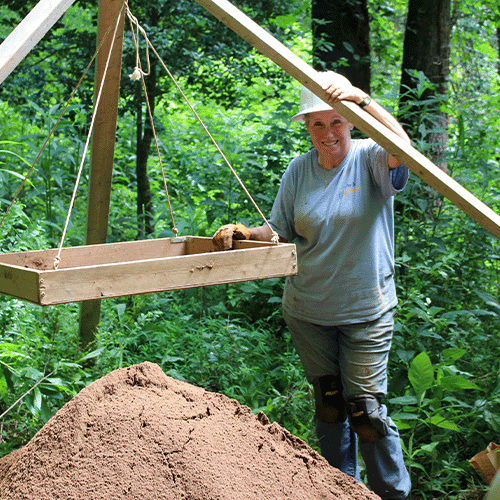 Susanne Newberry screening dirt in North Georgia.
